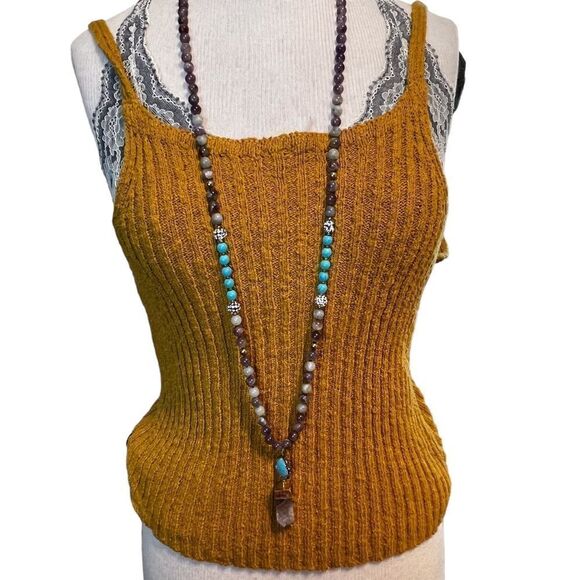 Free People  |||  rusty gold tank. You can wear the plunging side front or back. - Picture 4 of 10